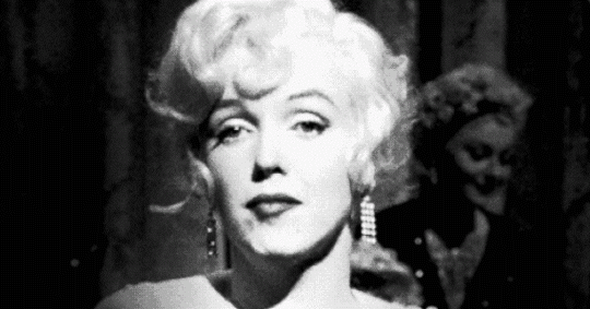 Marilyn-Monroe-Shrug-GIF-source.gif